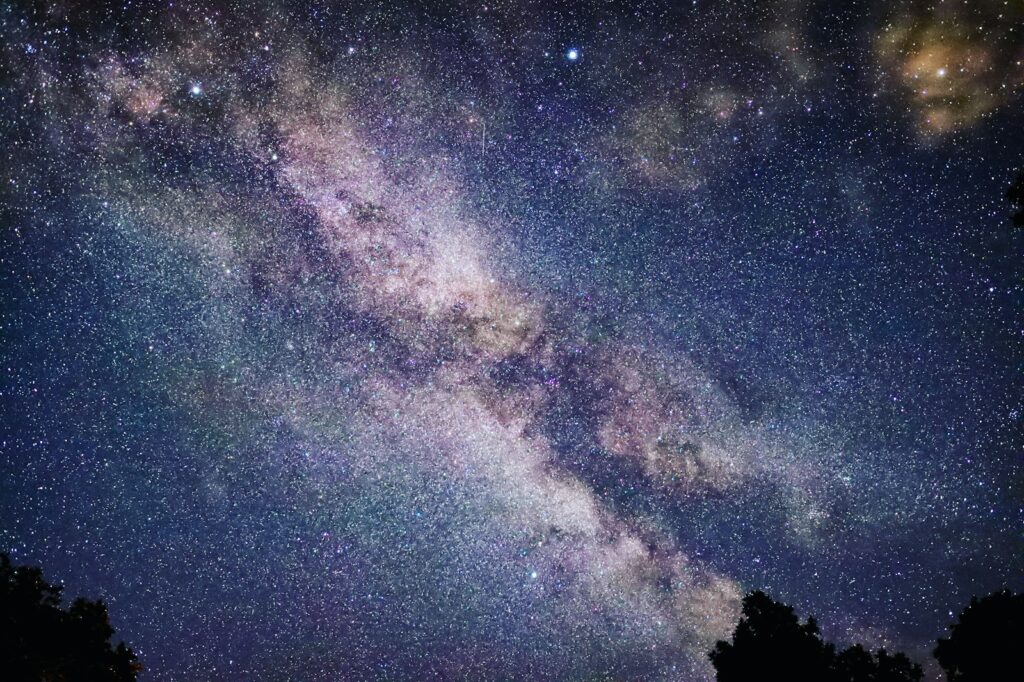 blue and white sky with stars